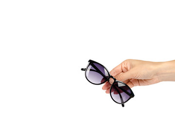 Stylish plastic sunglasses with hand isolated on white background, copy space template