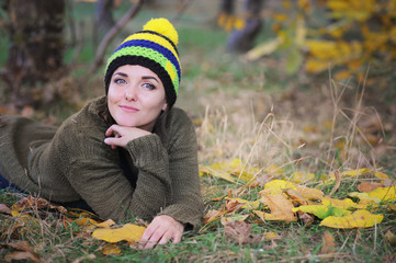 Young woman portrait, resting outdoor in park