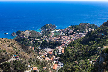 The view from the small village Castelmola at mountain top above Taormina, with the view of Mediterranean Sea and the skyline of Taormina.