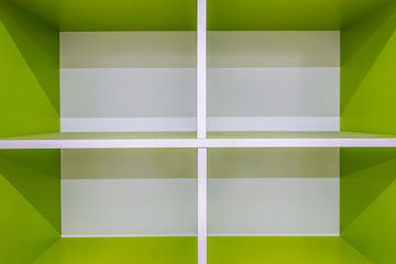 The image green color wooden wall and a shelf. wooden elements for design. Empty shelves