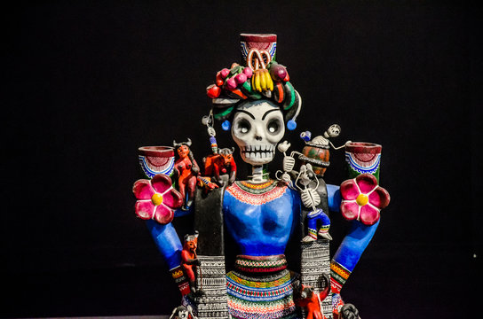 catrina mexicana de barro  candelero