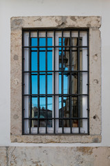 Fototapeta na wymiar Window with a reflection, Lisbon, Portugal