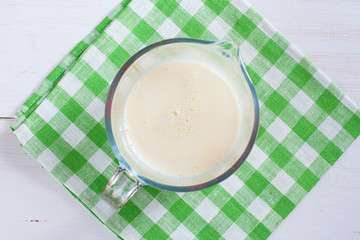 Step-by-step preparation of broccoli with cheese on a wooden table - preparation of the necessary...