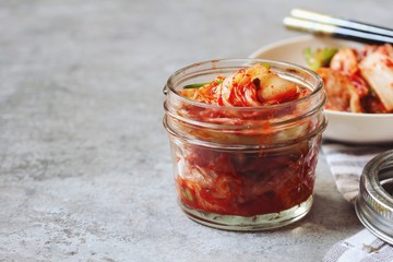 Homemade kimchi in a jar close up, selective focus