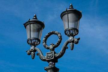 Fototapeta na wymiar Old street lamp at Pushkin Square. Moscow, Russia
