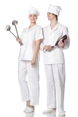 Portrait of a young couple of cooks