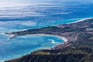 The view from the small village Castelmola at mountain top to Naxos Giardini , with the view of Mediterranean Sea. Castelmola, Sicily, Italy.