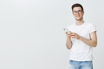 You were asking. Portrait of carefree happy and cute young caucasian guy with bristle in glasses...