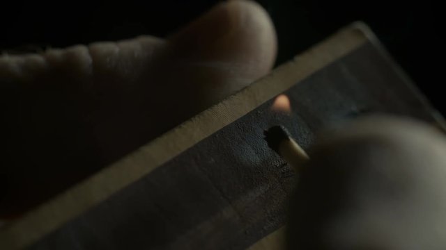 A macro shot of match box isolated on black background.