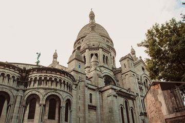 Fototapeta na wymiar The amazing facade of the basilica Sacre-Coeur. View from below. Symbol of the Montmartre district. Paris, France