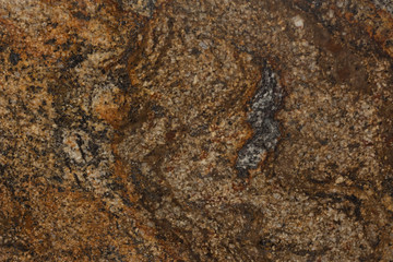 Strict brown granite background for bizarre design.