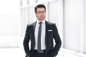 Fototapeta premium beautiful businessman in the office background