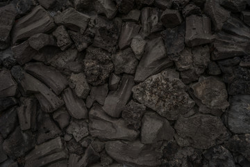 Fototapeta premium Hintergrund Steine Schlacke Hochofenschlacke sehr dunkel low-key - Background stones slag blast furnace slag very dark low-key