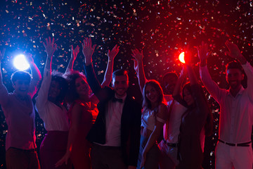 Friends celebrating New Year at night club