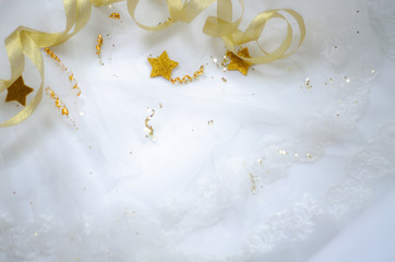 Golden ribbon on a white background.Coppy space..