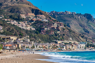 Fototapeta premium Letojanni. Nestled to the north of Taormina, Letojanni is a popular coastal resort. Sicily, Italy.