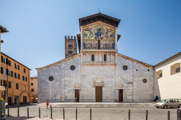 Fototapeta na wymiar Lucca Italy July 4th 2015 : The Basilica of San Frediano is a Romanesque church in Lucca, Italy, situated on the Piazza San Frediano