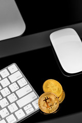 Background with bitcoin on the keyboard