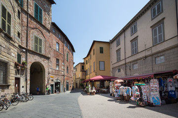 Fototapeta na wymiar Shops selling tourist related items in Lucca Italy