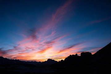 Mountains silhouettes on colorful sunrise