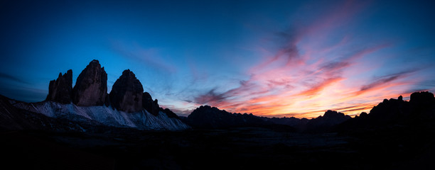 Mountains silhouettes on colorful sunrise