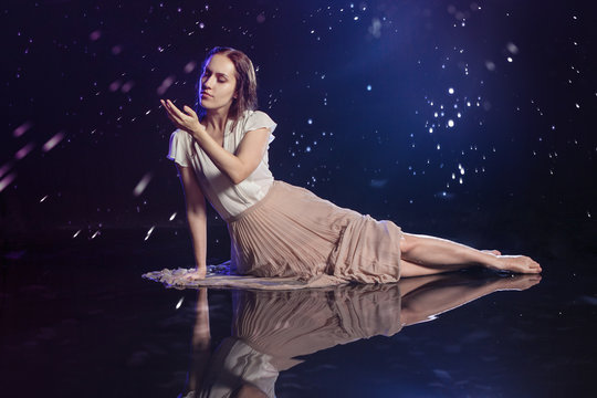 Photo art, young woman dreams to starry sky.