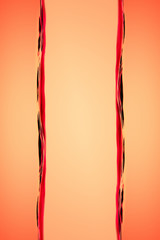 Conceptual photo. Two calm surface of the water in a beautiful Golden pink color