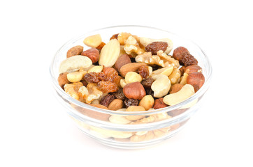 Student food in glass bowl. Student fodder. Snack mix of dried almonds, cashews, peanuts, walnuts,...