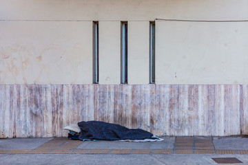 Homeless Person Sleeping on the Streets of Buenos Aires, Argentina