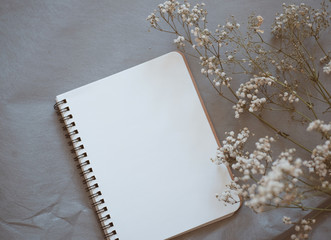 flower with blank notebook for background