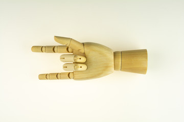 Wooden hand for drawing isolated on white background.