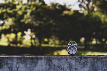 Naklejka premium Retro Alarm Clock with bokeh
