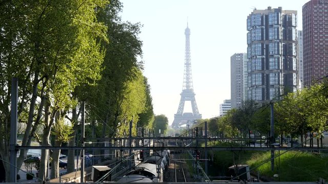 Eiffel Tower with metro rer line and high-rise buildings in Paris