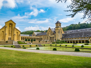 Fototapeta na wymiar The buildings of the new Trappist Cistercian Orval Abbey, Abbaye Notre-Dame dOrval, in Villers-devant-Orval, Province of Luxembourg, Belgium