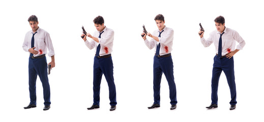 Obraz premium Businessman wounded in gun fight isolated on white