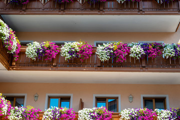 Traditional flowered balcony at the Alps, Austria.