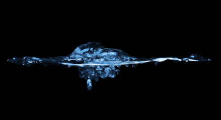 water splash with drops isolated on  black background