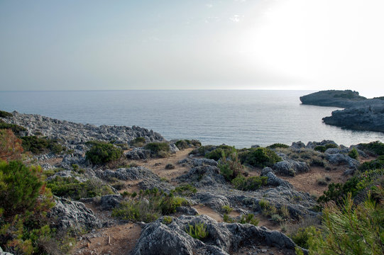 Arduous path to a clifftop along the coast of Marina di Camerota, Italy