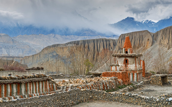 Ancient buddhist stupa among Himalaya mountains