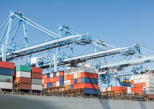 Shipping containers and a container crane