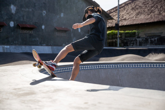 Young skater in a skate park