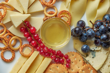 cheese platter on a plate with berries