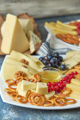 cheese platter on a plate with berries