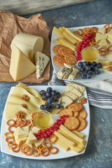 cheese platter on a plate with berries