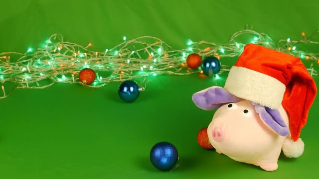 mumps with falling Christmas decorations toys taws, New year 2019 on green Chroma key