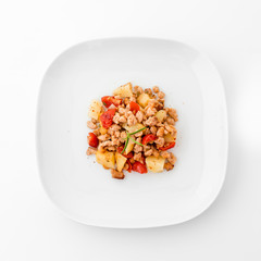 Dehydrated soy meat with potatoes, tomatoes and rosemary. Vegan Food