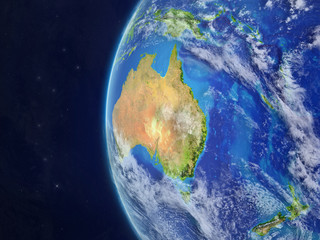Australia from space on beautiful model of planet Earth with very detailed planet surface and clouds.