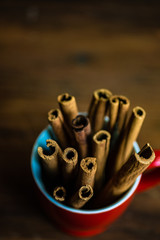 Cinnamon sticks in cup