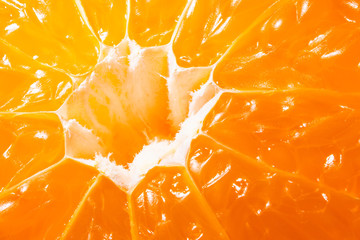 Orange abstract mandarin texture with middle. Juicy tangerine, chopped fresh clementine. Natural...
