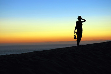 Silhouette on the dune of Pilat